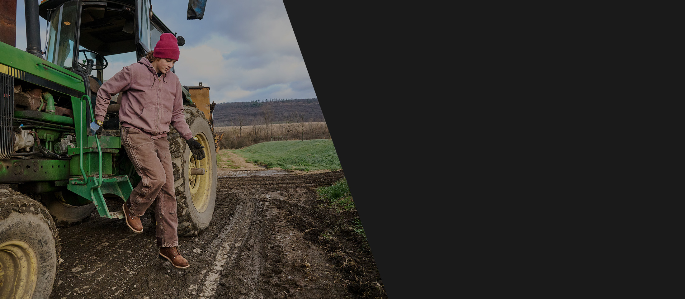 A woman climbing out of a tractor wearing the Elm 8" Waterproof Logger in brown.